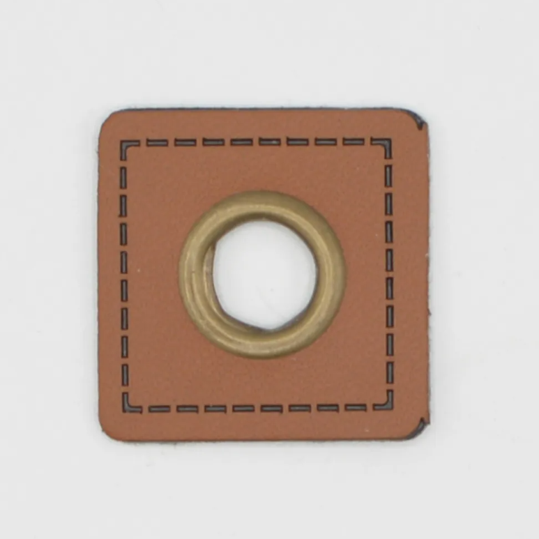 Image de 2 Œillets 9 mm sur cuir - Cognac