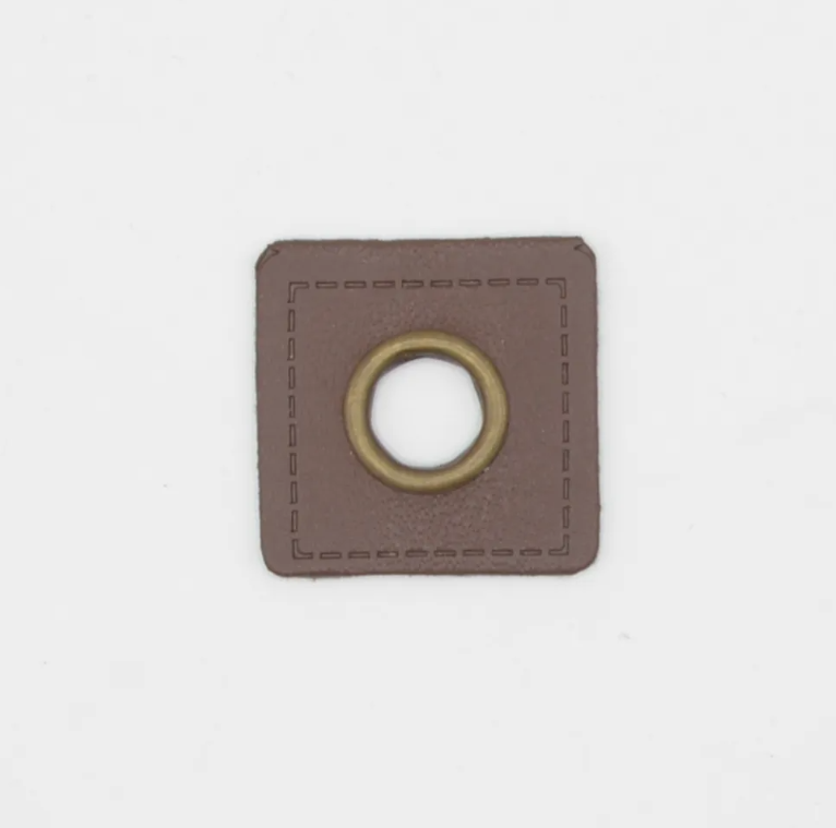 Image de 2 Œillets 9 mm sur cuir - Brun