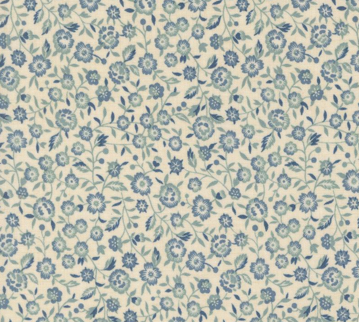 Image de ''Sacré Bleu'' par Moda - Fleurs bleues fond beige / Coton 1/2 m